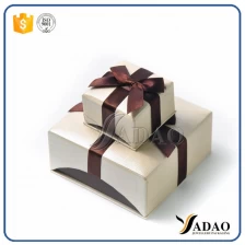 China Portabl de atacado fino feito à mão MOQ uma linda caixa de papel com uma fita para joias como um anel de brincos pingente fabricante