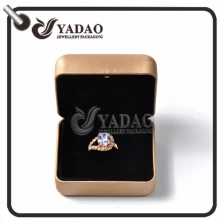 ประเทศจีน High end golden steel ring box covered with pu leather in stock  suitable for holding gem ring silver ring diamond ring ผู้ผลิต