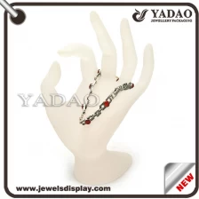 China High quality China supplier acrylic ring display stand hand shape manufacturer
