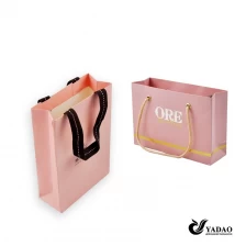 China Hot selling fashion kind of jewelry shopping bag paper bag for jewelry with logo and drawstring made in China manufacturer