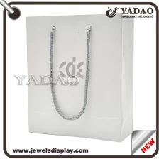 China Hot selling paper jewelry shopping bag with drawstring made in China manufacturer