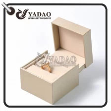China Luxurious unique customized plastic ring box covered with golden pu paper with nice soft velvet. manufacturer
