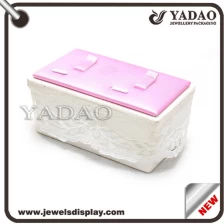 China Manufacture elegant special cake shaped double ring display stand with lace as decoration manufacturer