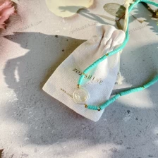 Cina perla gioielli naturali imballaggio beige bianco sporco tela di lino coulisse borsa sacchetto produttore