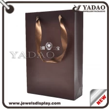 China Nice durable equisite luxury good  price designable coffee color silk ribbon handle paper bags/shopping bags/packaging bags manufacturer