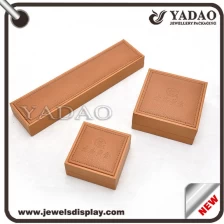 China Wholesale Custom brown PU leather gift boxes for jewelry gift and Cosmetic packing and storage for shop counter jewellery box manufacturer