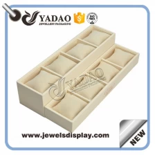 China Wholesale custom cream color PU leather jewelry and watch display trays with velvet pillow and custom gold hot stamping logo manufacturer