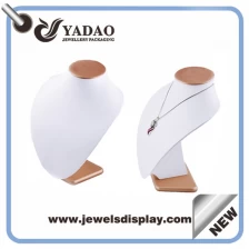 China Wooden Bust Jewelry Display good quality modern design Necklace Bust Jewelry Display White PU Leather Pendant Display Stand manufacturer