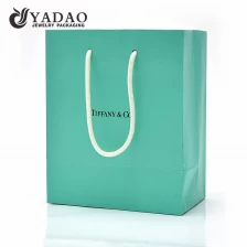 China Yadao CMYK paper bag spring color shopping bag for gift jewelry packaging bag with white rope handle manufacturer