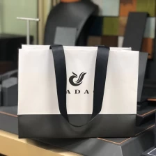 China Yadao cmyk printing paper bag custom logo shopping bag ribbon handle bag gift packaging bag manufacturer