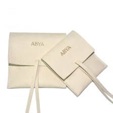 China Yadao Wholesales Microfiber Custom Logo 1.2mm Thickness Jewelry Beige String Pouch with Pad manufacturer