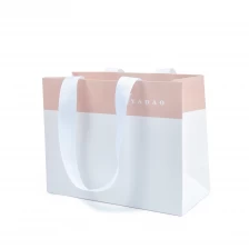 China Yadao customized jewelry packaging bag shopping gift bag with printing Logo and ribbon handle manufacturer