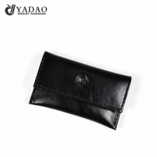 China Yadao noble pu leather jewelry pouch black packaging pouch with snap closure manufacturer