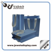 China customize machine cutting handmade shopping paper bag jewelry packaging printing paper bag fabricante
