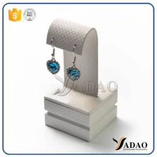 China fantastic lovely wholesale manufactury small attractive mdf covered with texture leatherette jewelry display for earring manufacturer