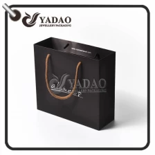 porcelana Bolsas de papel / bolsas de compras perfectas y elaboradas de alta calidad modernas de alta gama para empacar zapatos / ropa / regalos / velas fabricante