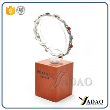 China lacquer wooden display base bracelet display stand holder C model jewelry display manufacturer