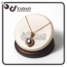 China new born special delicate beautiful creative pie shape jewelry display made by leatherette paper for pendant manufacturer