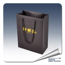 China paper bag jewelry packaging bag CMYK printing finish paper shopping bag jewelry bag customize brand paper bag manufacturer
