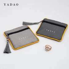China satin pouch bag zipper closure jewelry packaging bag tassels zipper handle gold trim pouch design wholesales manufacturer