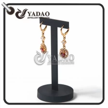 China simple long-lasting small CBM comfortable universal exquisite luxury mdf +lacquer finish/velvet/leatherette paper earring display stands manufacturer