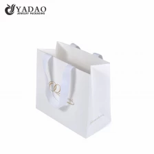 China white color fancy textured paper bag gift shopping bag paper jewelry packaging carrying manufacturer