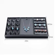 China wooden display tray multi-function jewelry tray ring earring pendant necklace display tray customize black pu leather finish jewelry display tray manufacturer
