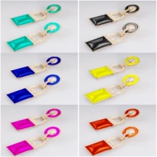 Çin New design resin round shaped english lock clip on earrings üretici firma