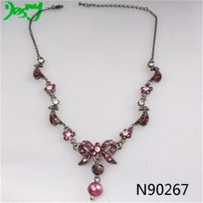 China pink crystal bowtie gold statement pearl necklace N90267 manufacturer