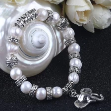 China Elephant Pendant 10mm White Pearl Alloy Bracelet Supplier China manufacturer