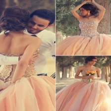 Chiny Różowa suknia balowa Koronkowe aplikacje Suknia ślubna z paciorkami księżniczka vestidos novia producent