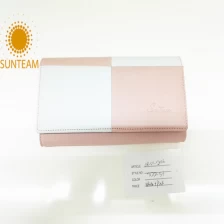 porcelana Solución de billeteras de mujer OEM PU cuero mujer cartera y billetera de cuero de alta calidad geunine fabricante