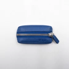 Chine Pochette en cuir ronde Pouch-pièces de monnaie en gros pochette fabricant