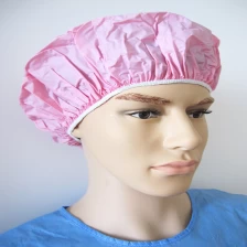 China Purely Pink PVC Single-Layer Disposable Bath Hat manufacturer