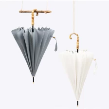 porcelana High Quality Windproof Umbrella with Bamboo Handle Umbrella Custom Logo Design Print Umbrella fabricante