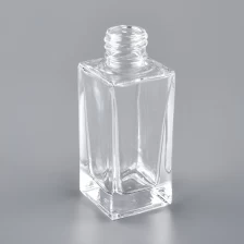 China Frasco de perfume de vidro vazio quadrado claro de 100ml fabricante