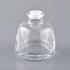 China Frasco de vidro de perfume decorativo de cristal 100ml com bomba de spray fabricante