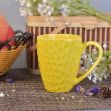 Cina Tazza da caffè in ceramica di colore giallo martellato da 10 once produttore