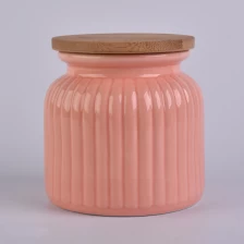 China 22oz wax filling glossy glazed ceramic candle jars with wood lid manufacturer