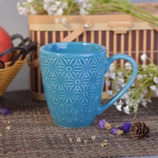 China 287ml Blue Glazed Ceramic Drinking Mug Candle Holders with Flower Design manufacturer