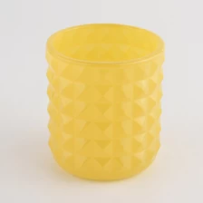 China 8oz glass candle vessel with emboss design yellow glass jar supplier manufacturer