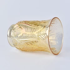 China Amber color leaves embossed glass hurricane candle holder manufacturer