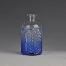 China Frasco de óleo essencial de vidro azul fabricante