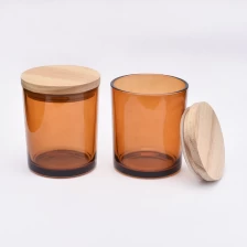 China Jarro de vela de vidro âmbar marrom com tampas de madeira fabricante