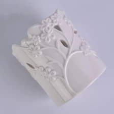 China Custom white flower perforated ceramic wedding candle holder manufacturer