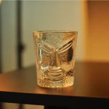 China Face design embossed glass candle holder manufacturer
