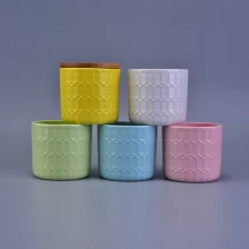 China Flower Pattern Debossed Colorful Ceramic Candle Holder With Wooden Lid manufacturer