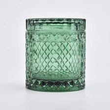 China GEO Cut Green Translucent Glass Candle Jars With Lids pengilang