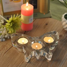 porcelana Soporte de vela de vidrio en forma de mariposa fabricante