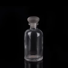 China Glass oil bottle with lid manufacturer